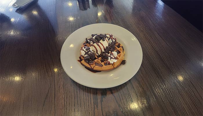 Ruby's Family Restaurant in Minnesota waffles topped with ice cream and chocolate sauce